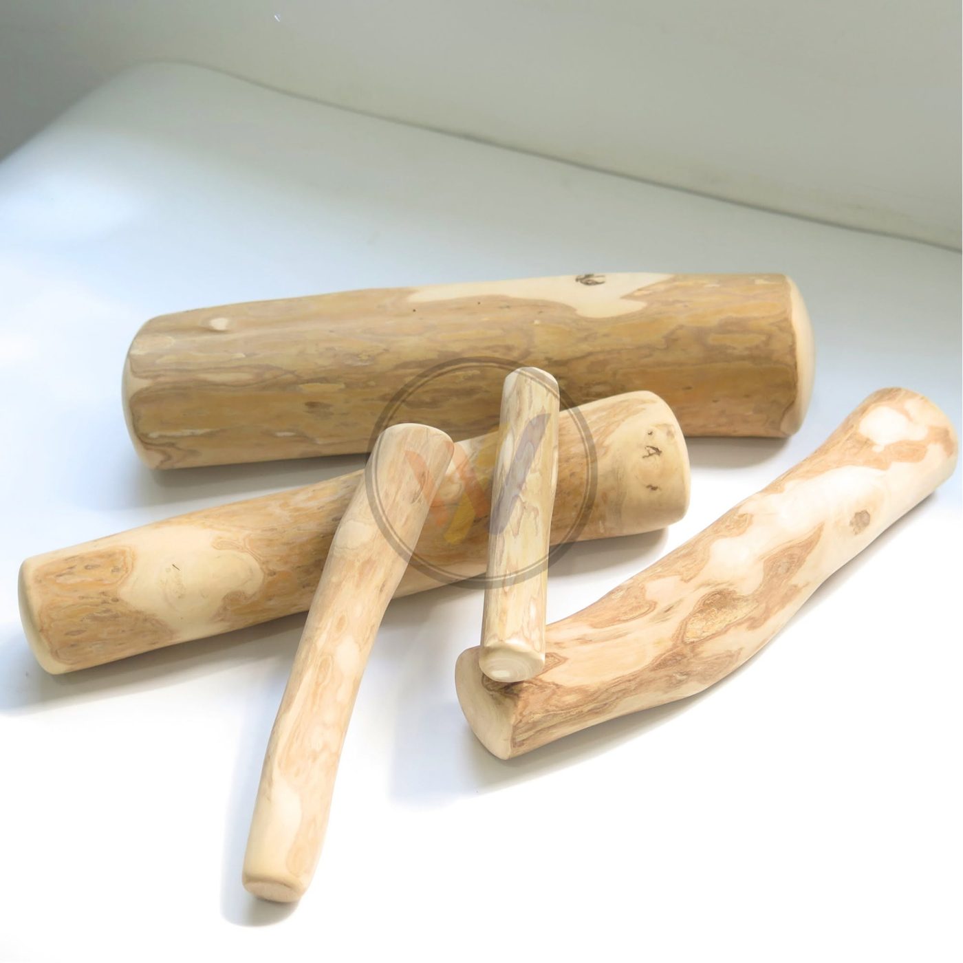 Coffee wood dog chews with natural shapes, each cut from a real tree trunk
