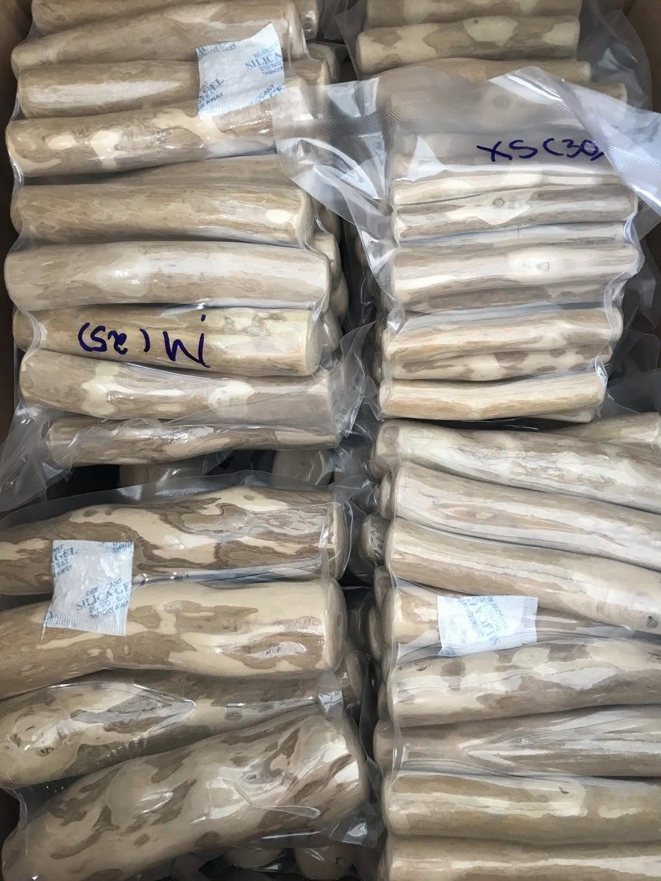 Vacuum-packed coffee wood dog chews ready for export