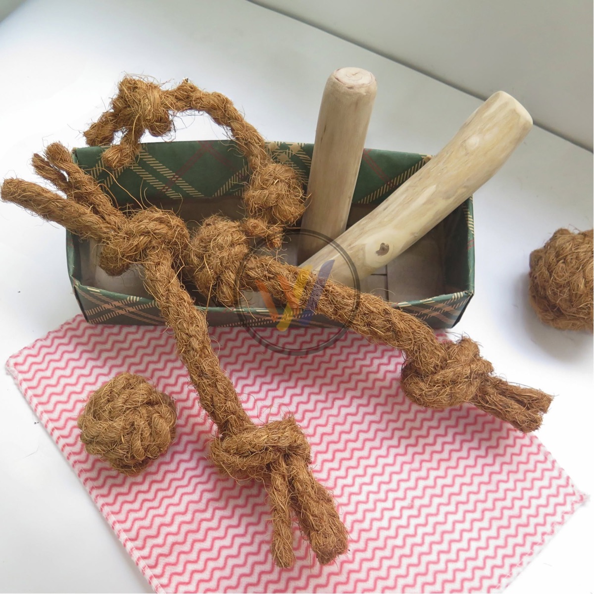 Natural coffee wood dog chew displayed in a lifestyle setting